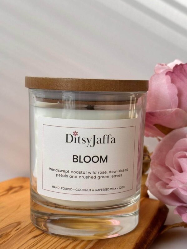 Close up of DitsyJaffa Bloom hand-poured candle focusing on label