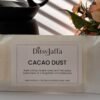 Close up of DitsyJaffa Cacao Dust hand-poured wax melt focusing on label