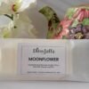 Close up of Ditsyjaffa Moonflower hand-poured wax melt focusing on label