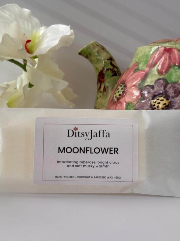 Close up of Ditsyjaffa Moonflower hand-poured wax melt focusing on label