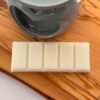 Flat lay top view of a DitsyJaffa Coffee Break wax melt snap bar