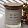 ditsyjaffa-cacao-dust-hand-poured-candle-close-up.jpg Close up of DitsyJaffa Cacao Dust hand-poured candle focusing on label
