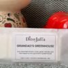 Close up of DitsyJaffa Grandad's Greenhouse hand-poured wax melt focusing on label