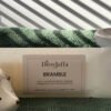 Close up of DitsyJaffa Bramble hand-poured wax melt focusing on label