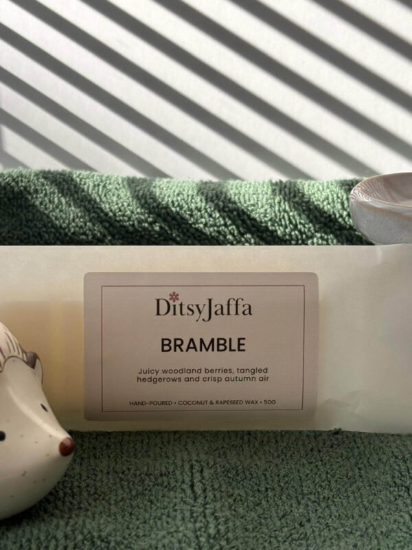 Close up of DitsyJaffa Bramble hand-poured wax melt focusing on label