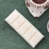Flat lay top view of a DitsyJaffa Bramble wax melt snap bar